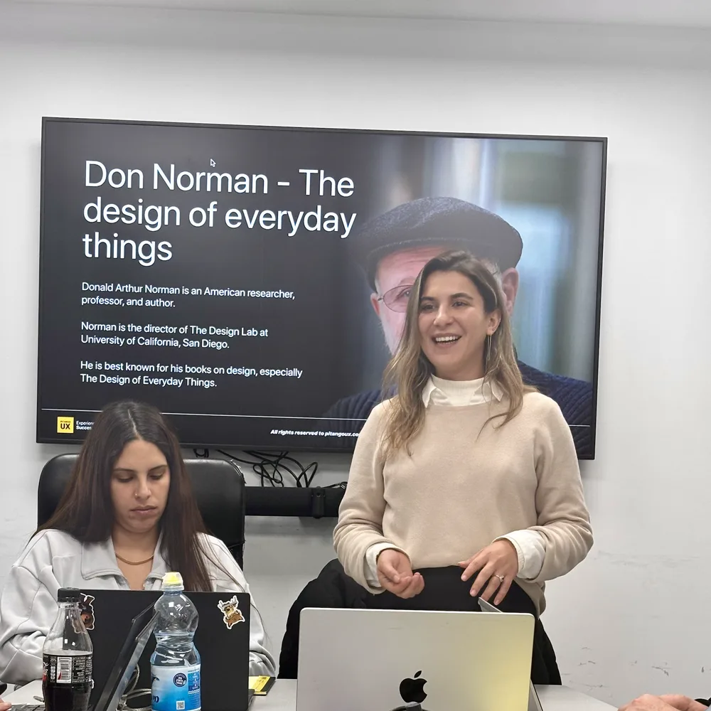 Raz teaching a UX class on Don Norman